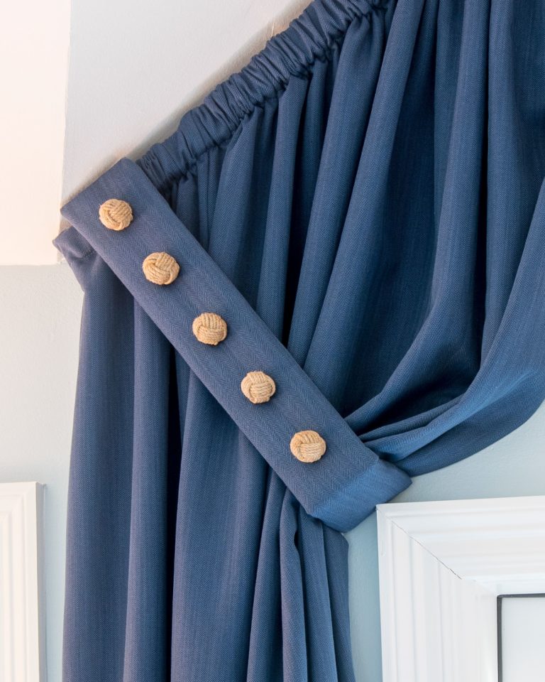 Window Treatments with Upholstered Buttons on Tiebacks